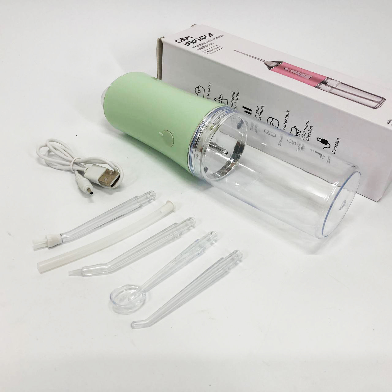 Іригатор для чищення зубів та порожнини рота Oral Irrigator з акумулятором та змінними насадками. Колір: зелений